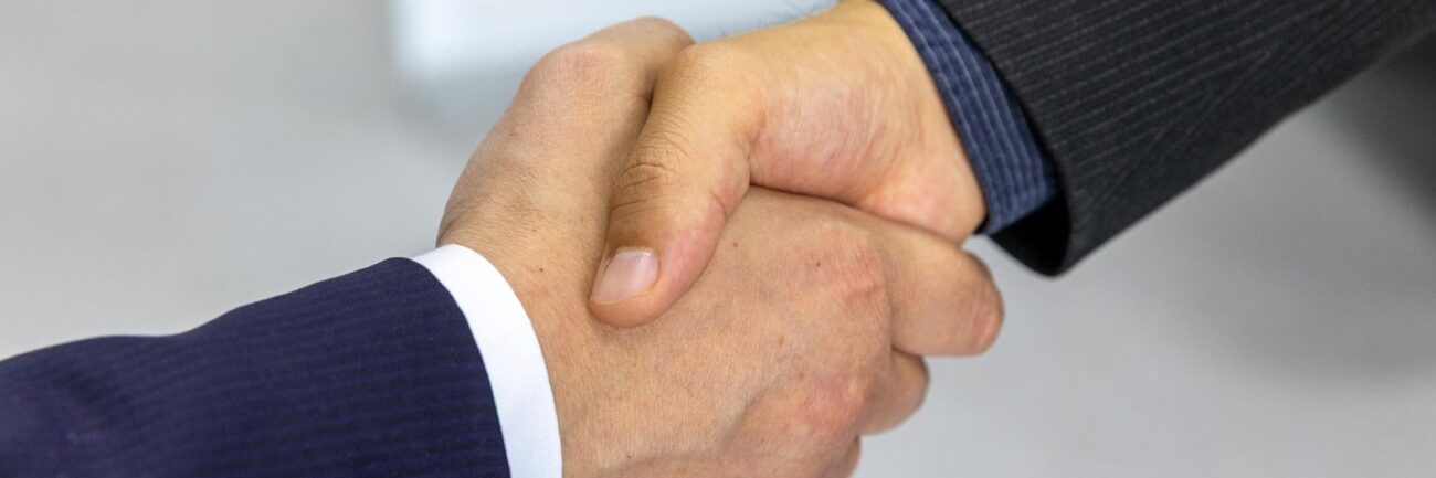Two businessmen shaking hands after an agreement Two businessmen shaking hands after an agreement