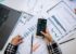 Charts and smartphone used for data analysis